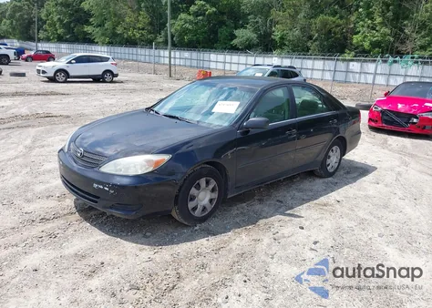 2003 Toyota Camry Le z USA, uszkodzony, nr VIN 4T1BE32K23U148976